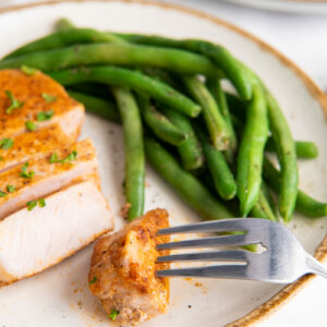 pork chops on a white plate