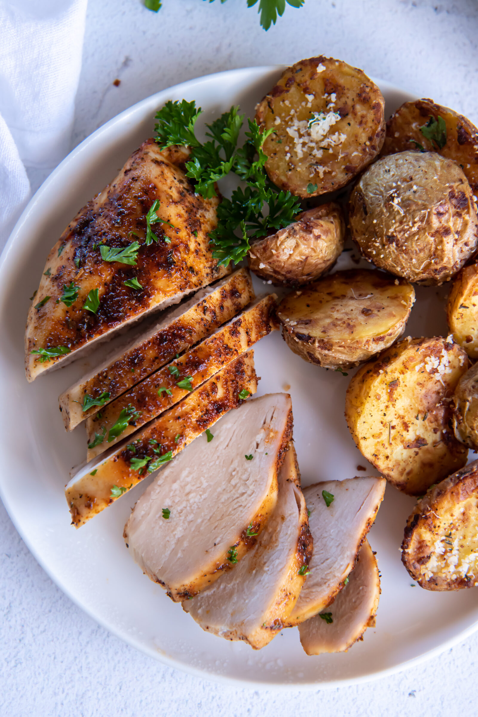 sliced chicken on a white plate