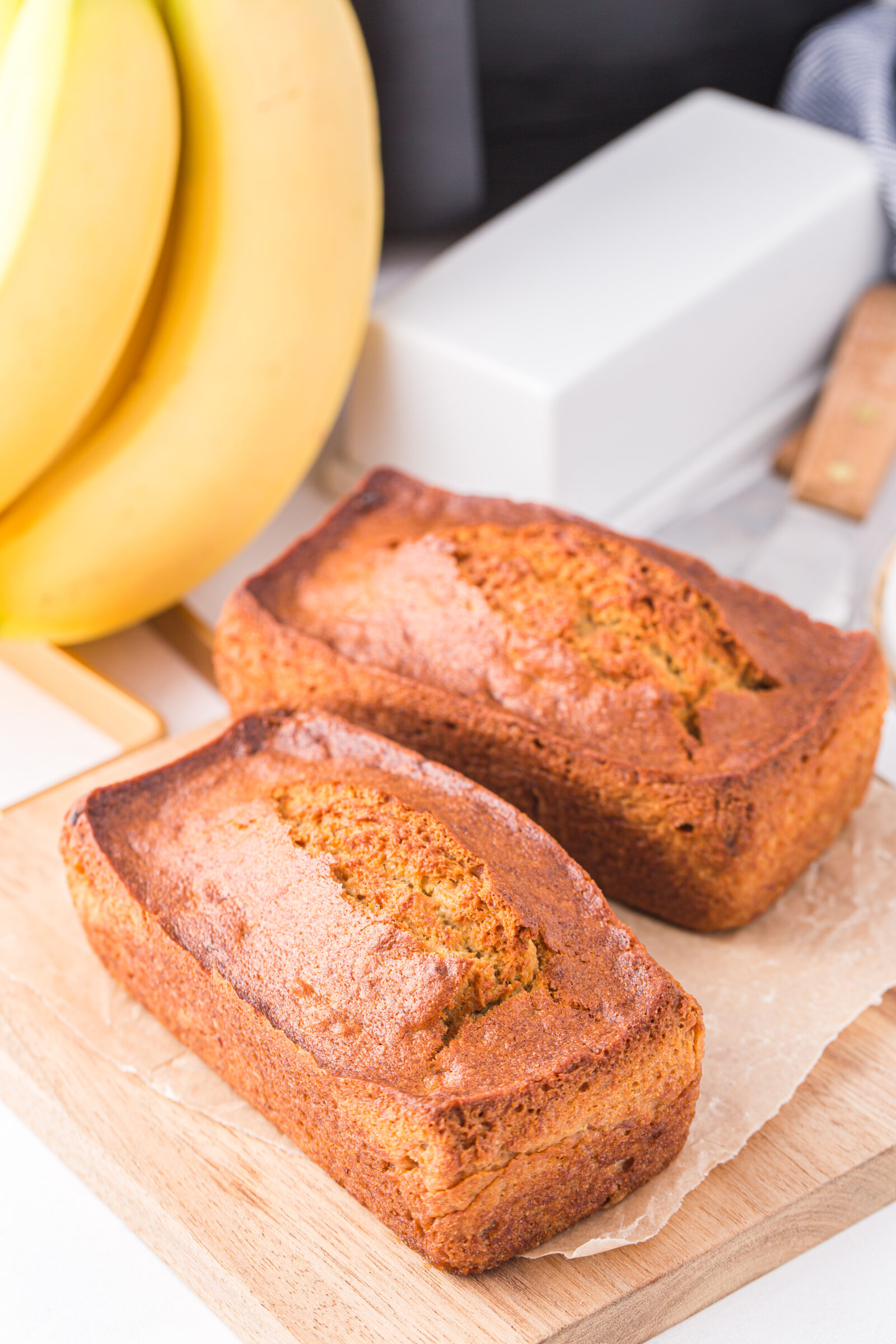 mini loaves on a wooden board