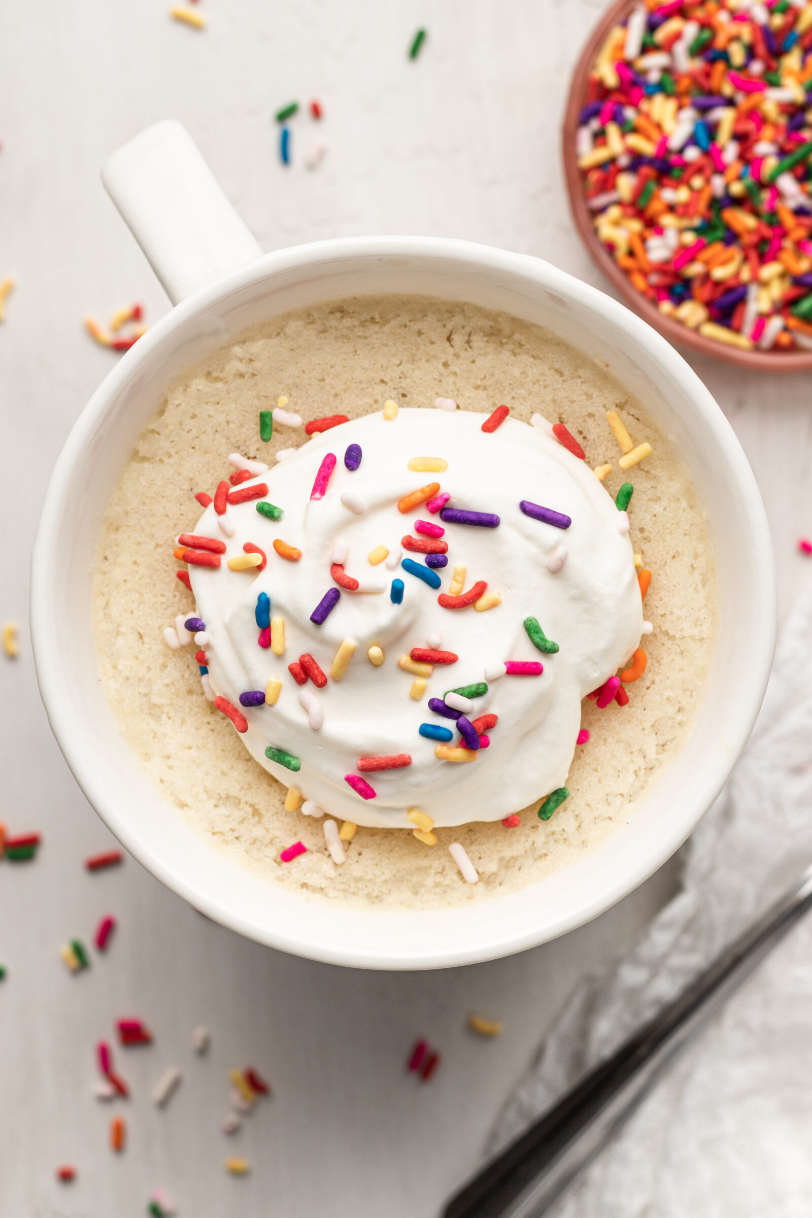 cake in a white mug