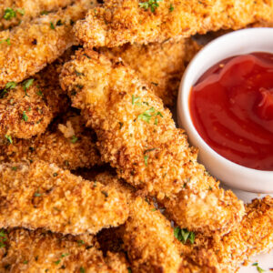 chicken strips on a white plate