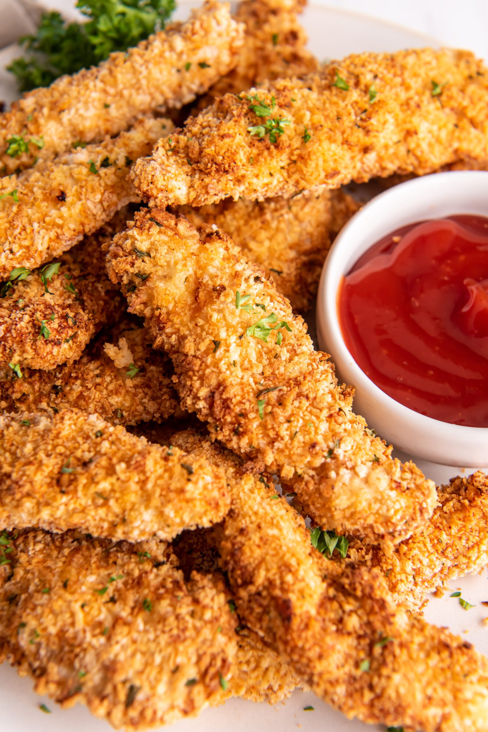 chicken strips on a white plate