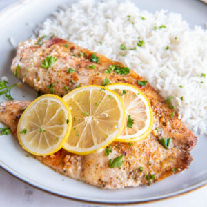 tilapia on a white plate