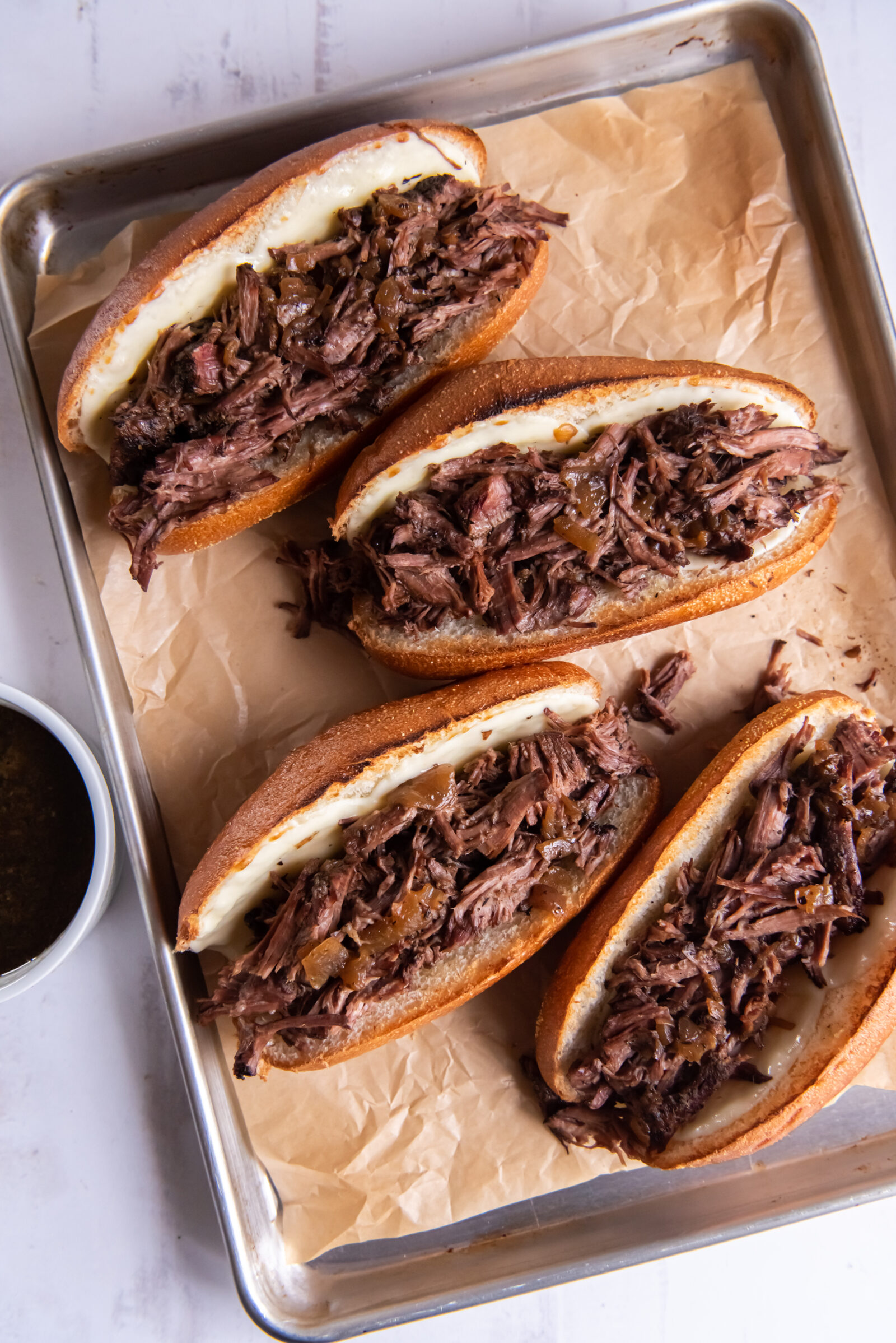 sandwiches on brown parchment paper