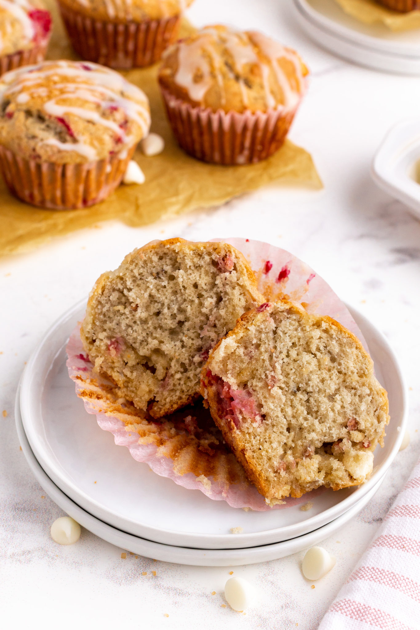 muffin cut in half on a white plate
