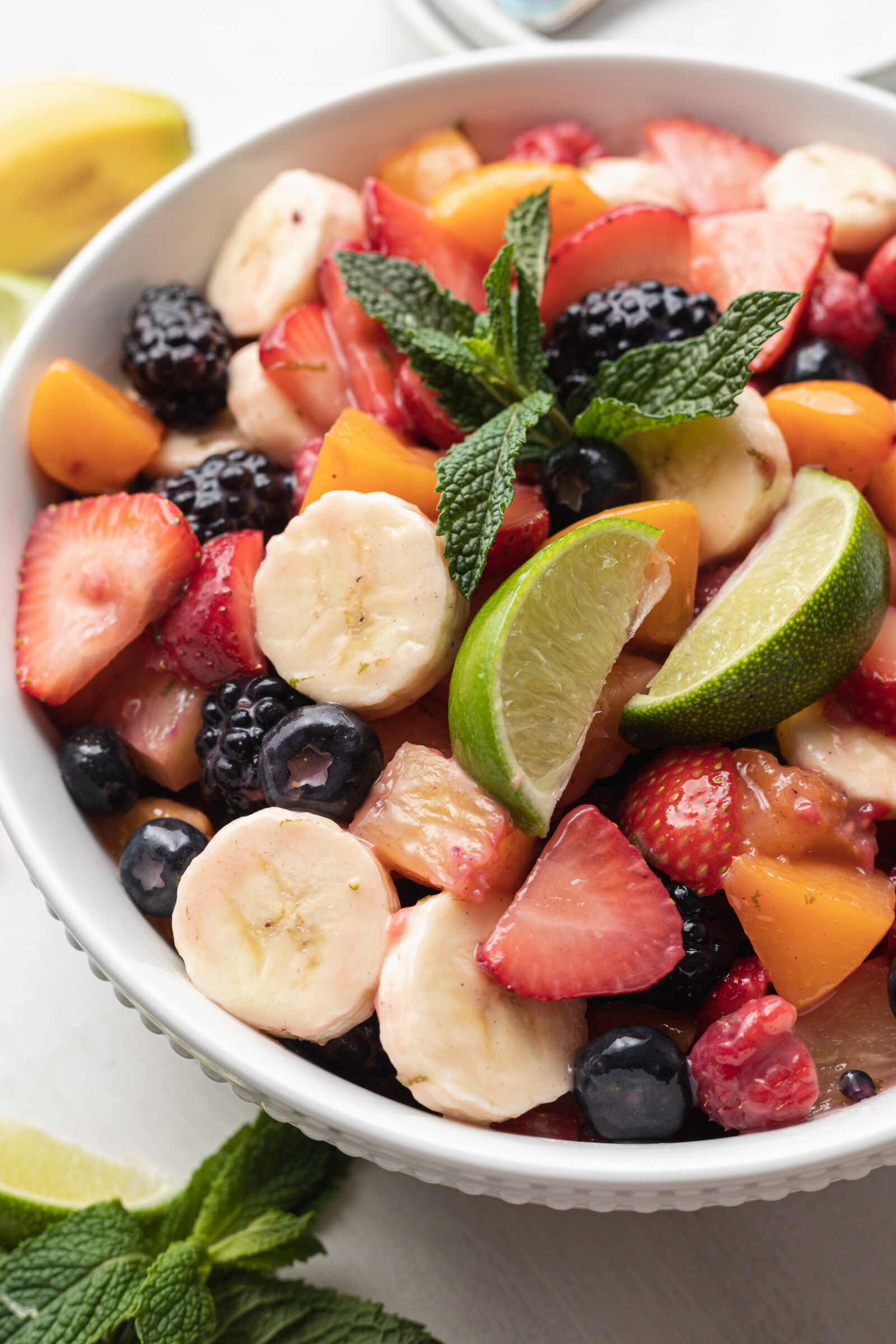 fruit salad in a white bowl