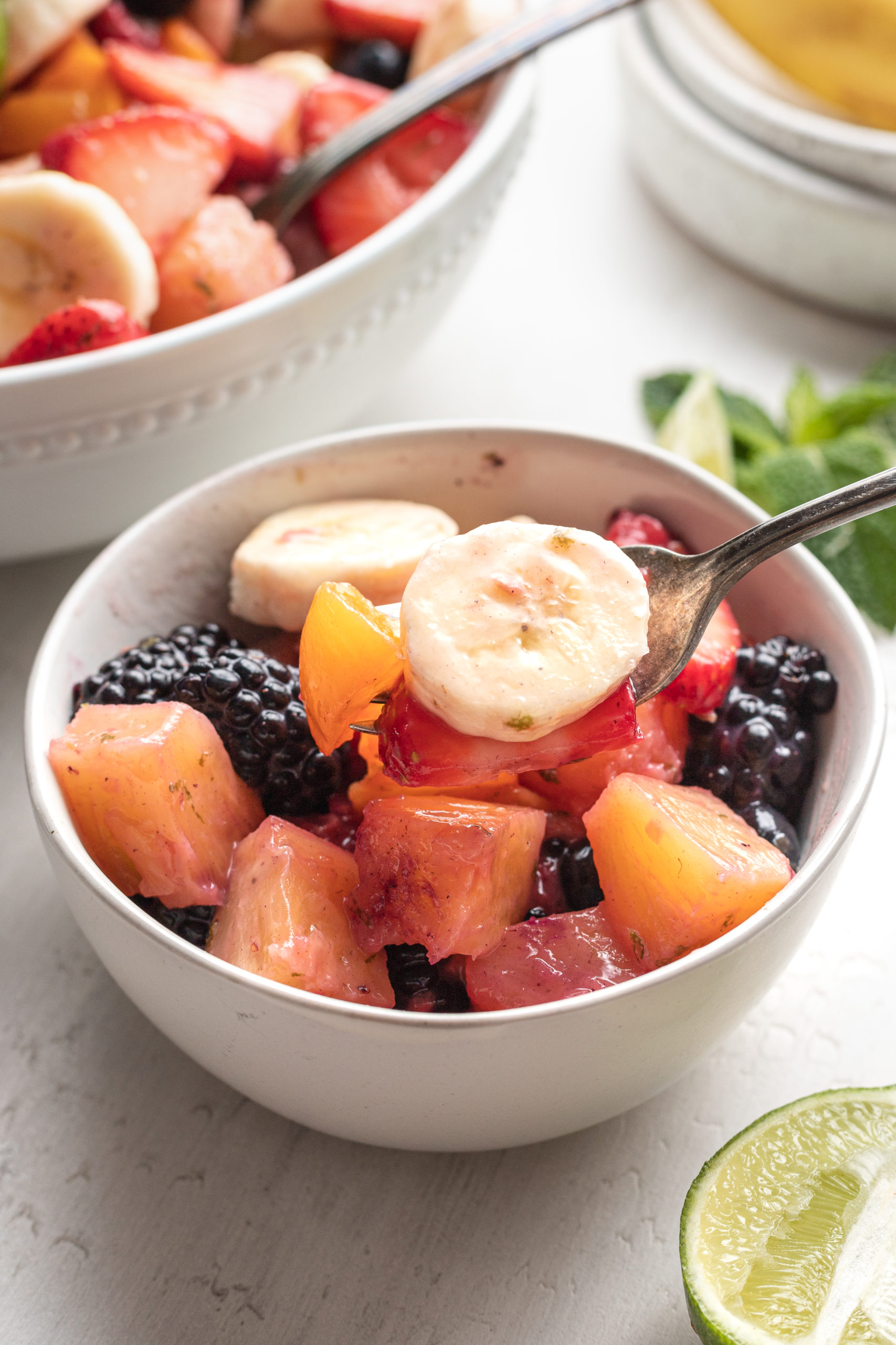 fruit salad in a white bowl
