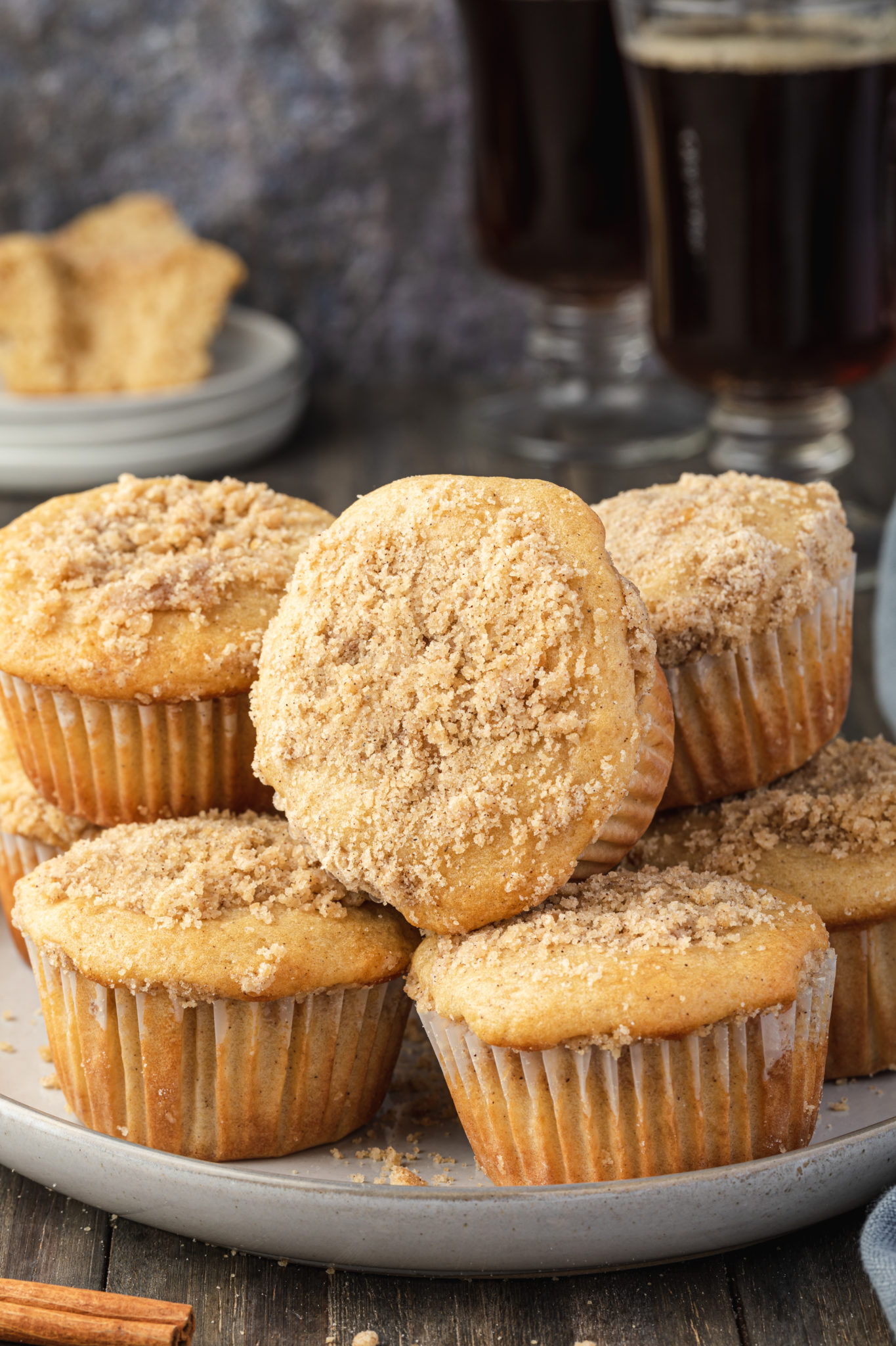 A stack of muffins from pancake mix on a white plate.