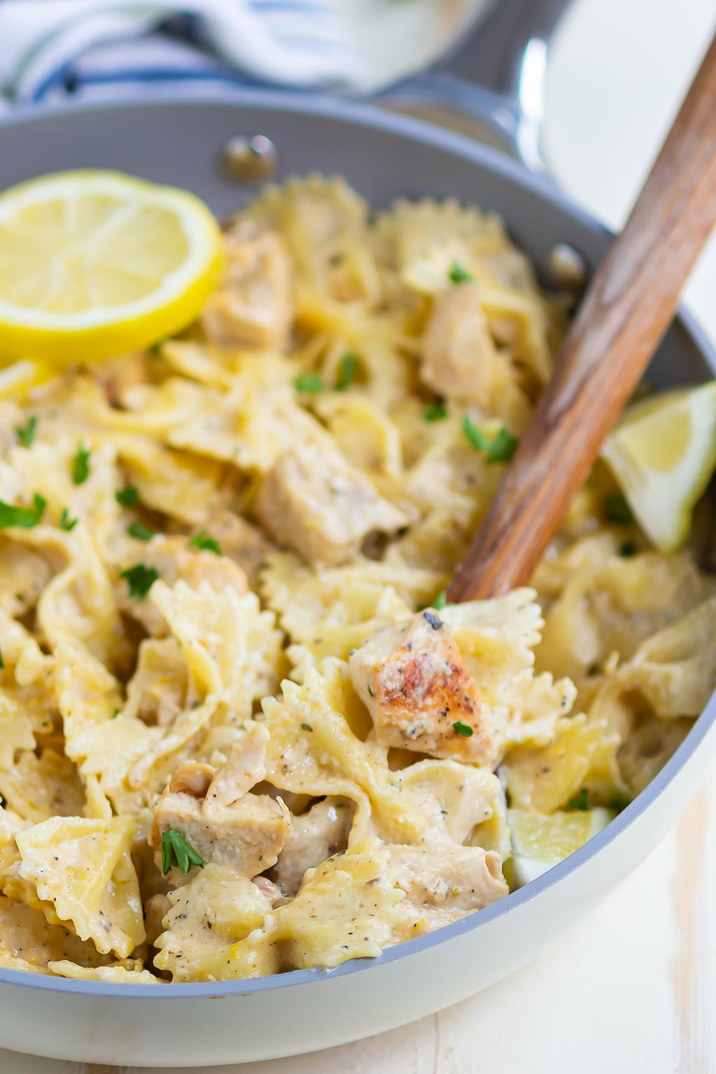 pasta in a skillet with a serving utensil