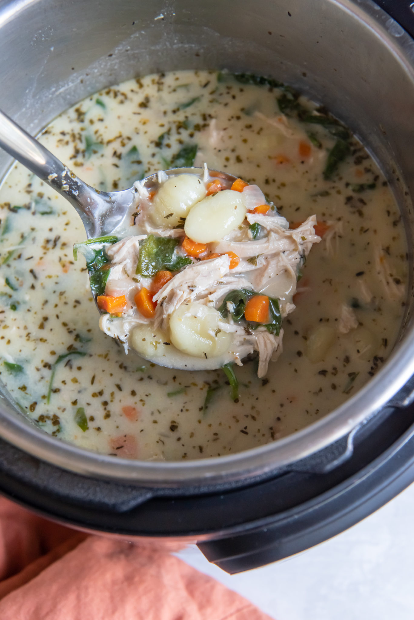 chicken and gnocchi soup in the insert of an Instant Pot