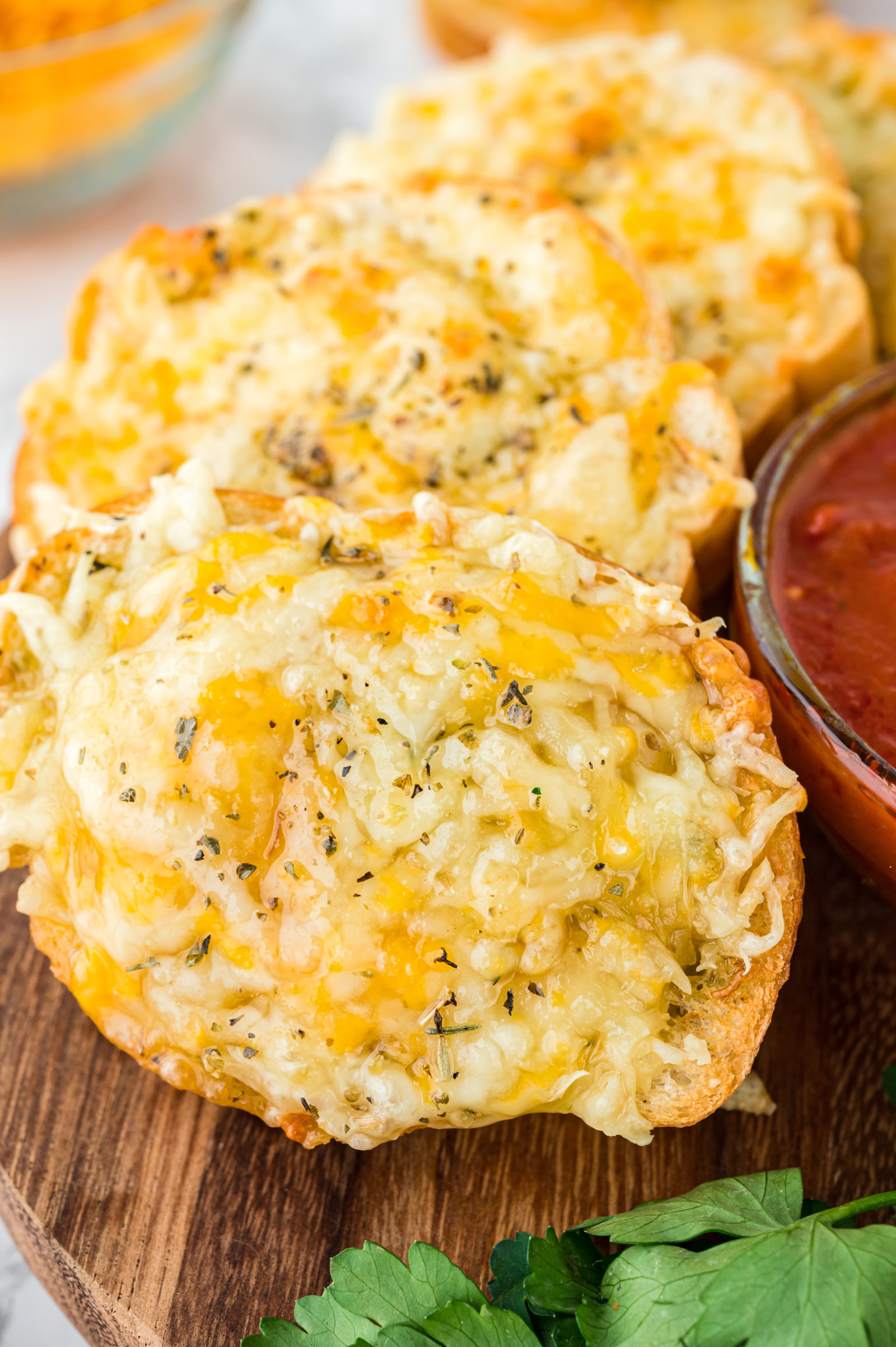 garlic bread on a brown serving tray