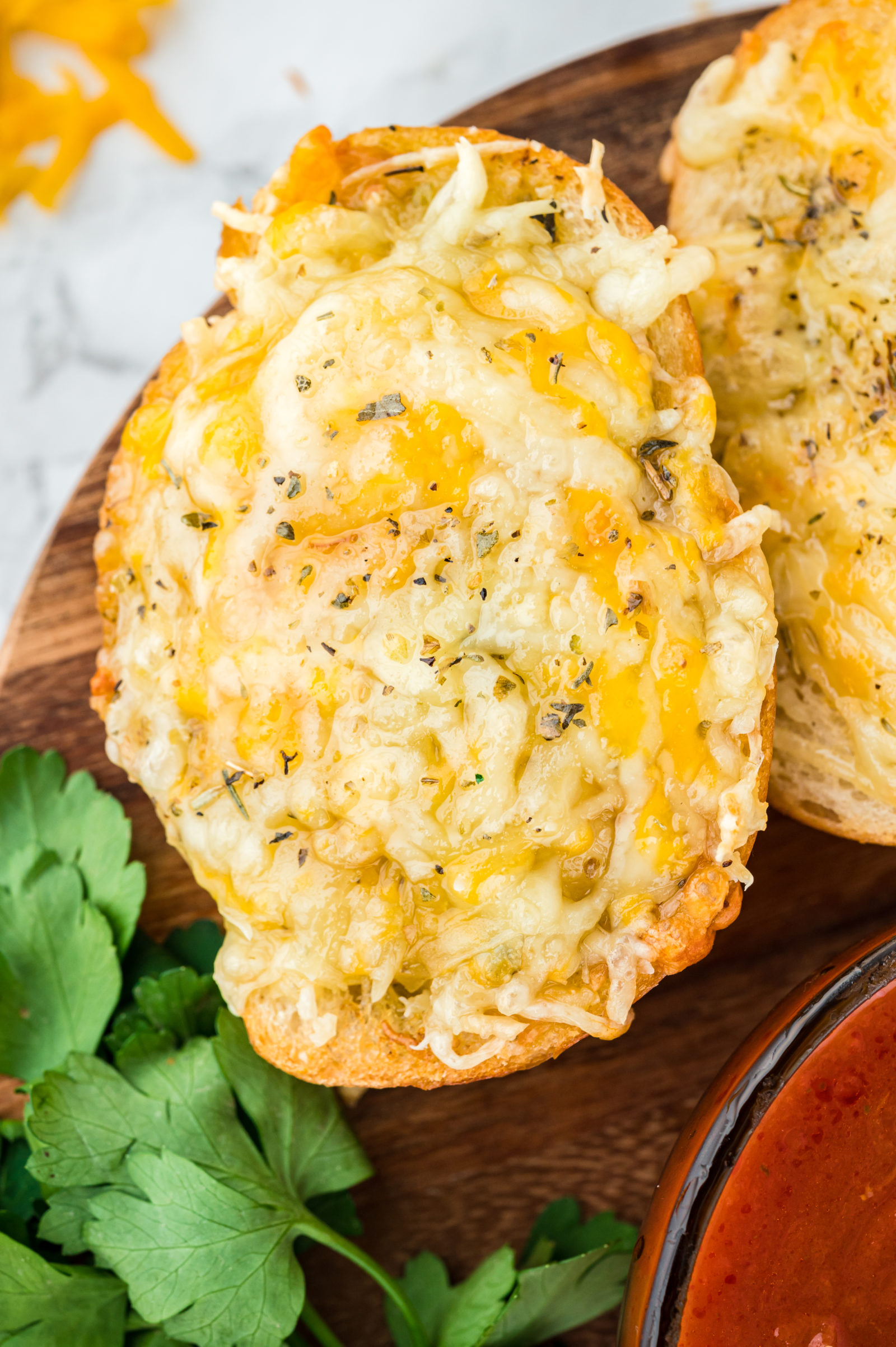 garlic bread on brown serving tray