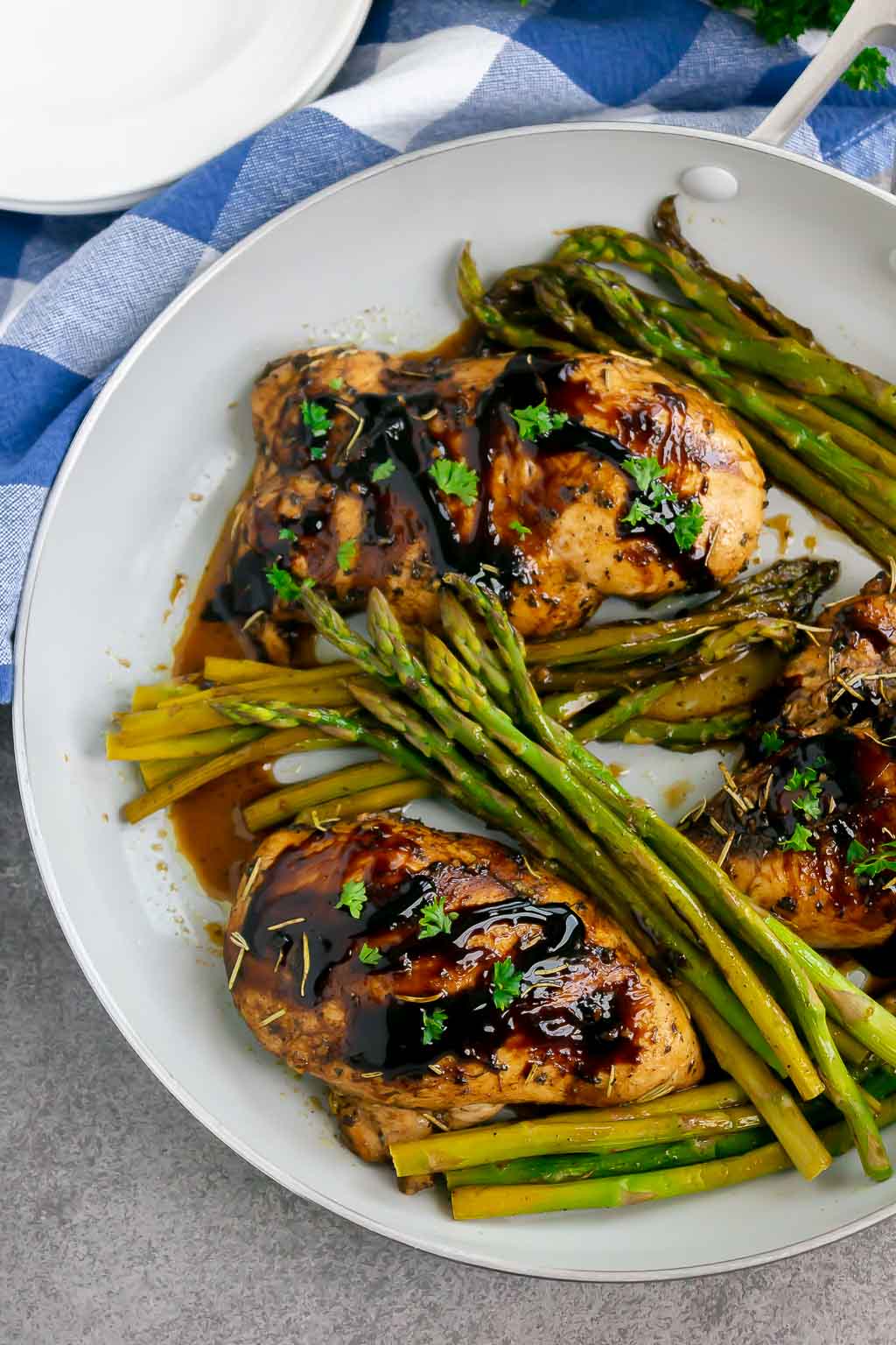 chicken and asparagus in a skillet