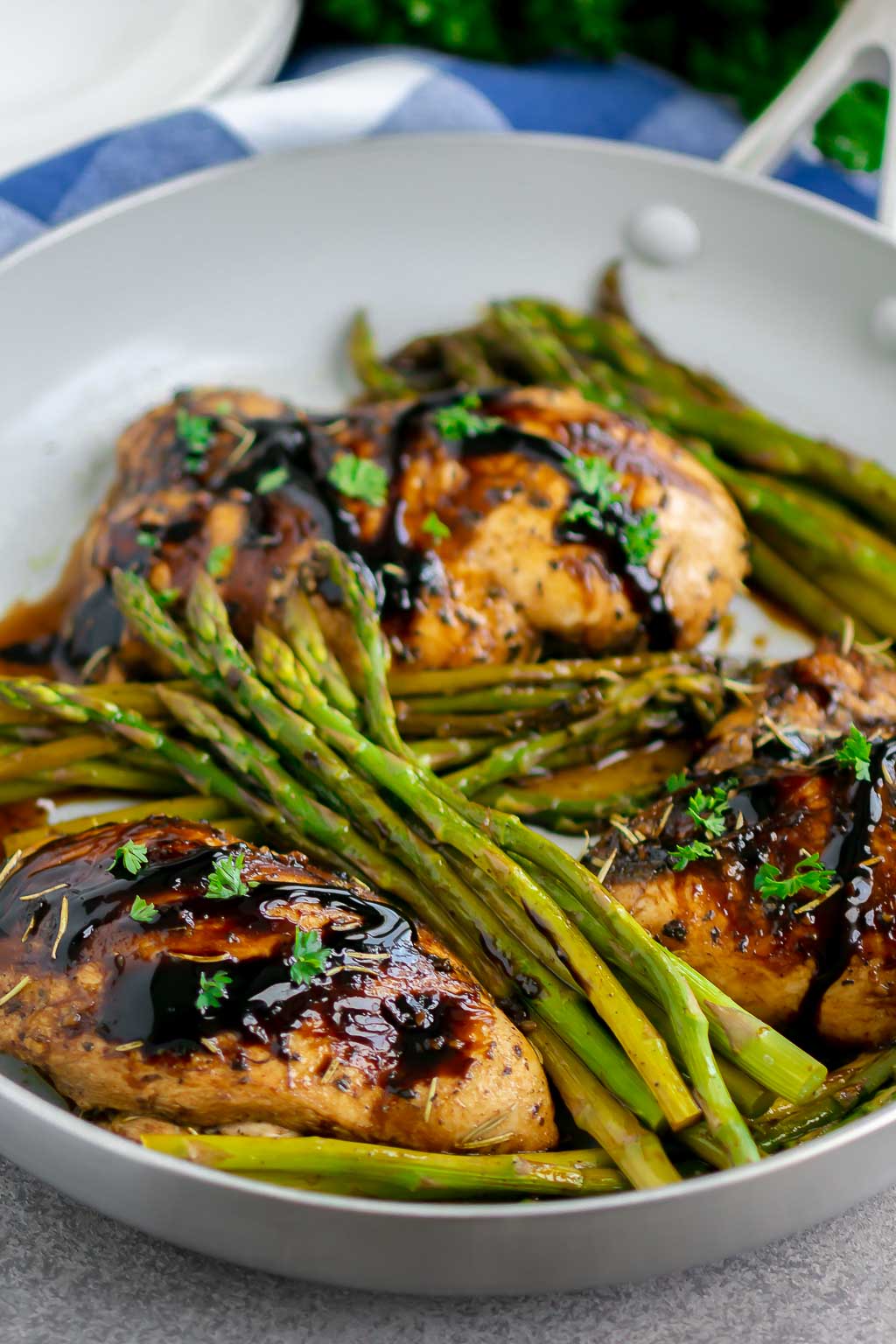 chicken and asparagus in a skillet