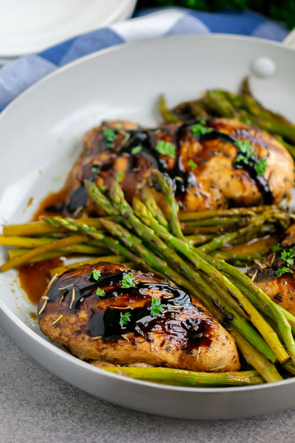 chicken and asparagus in a skillet