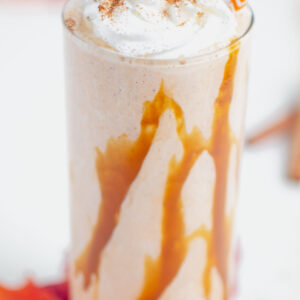 pumpkin shake in a clear glass