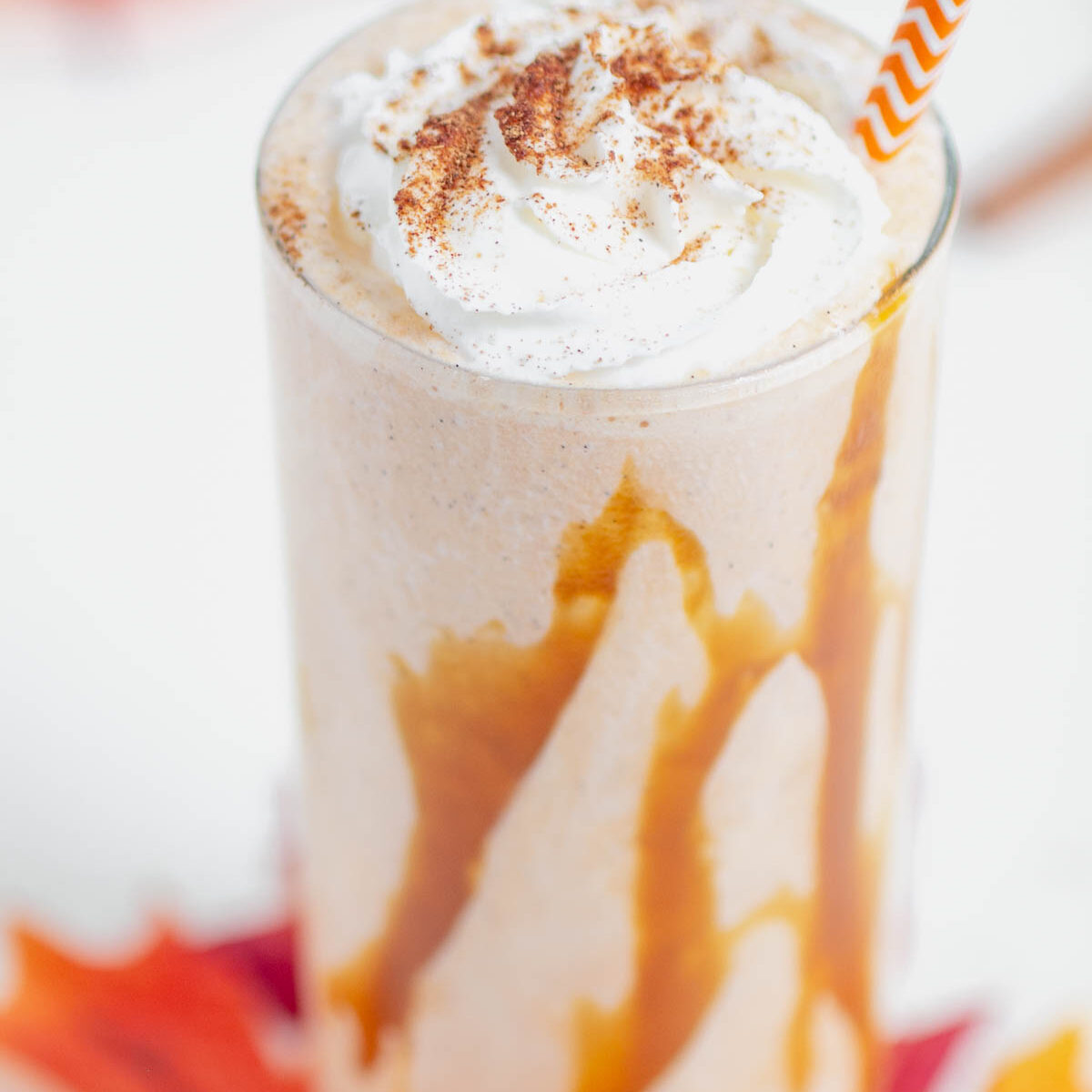 pumpkin shake in a clear glass