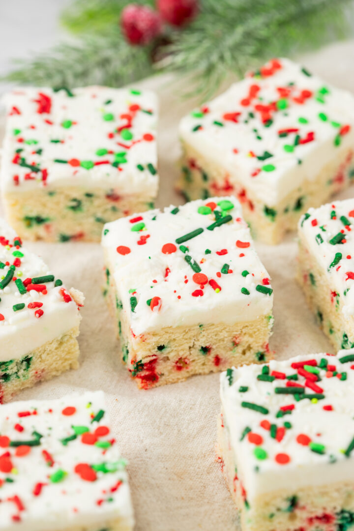 cookie bars spread out on a white surface