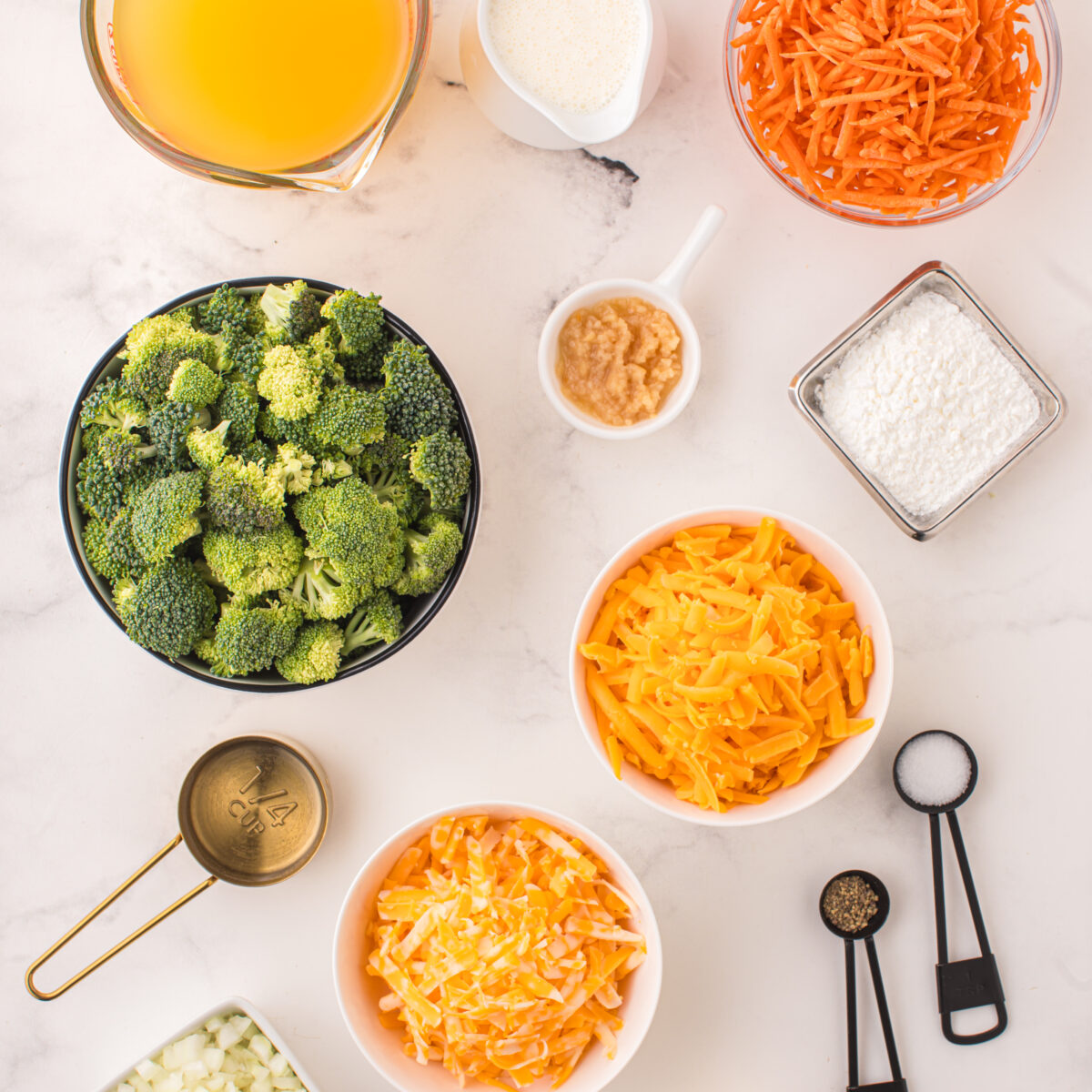 ingredients in bowls on a white surface