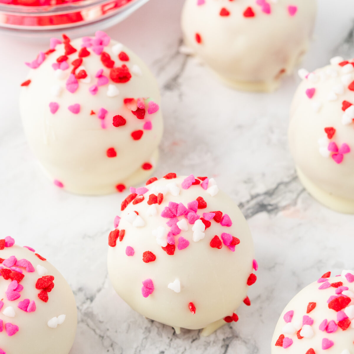 cake truffles on a white surface