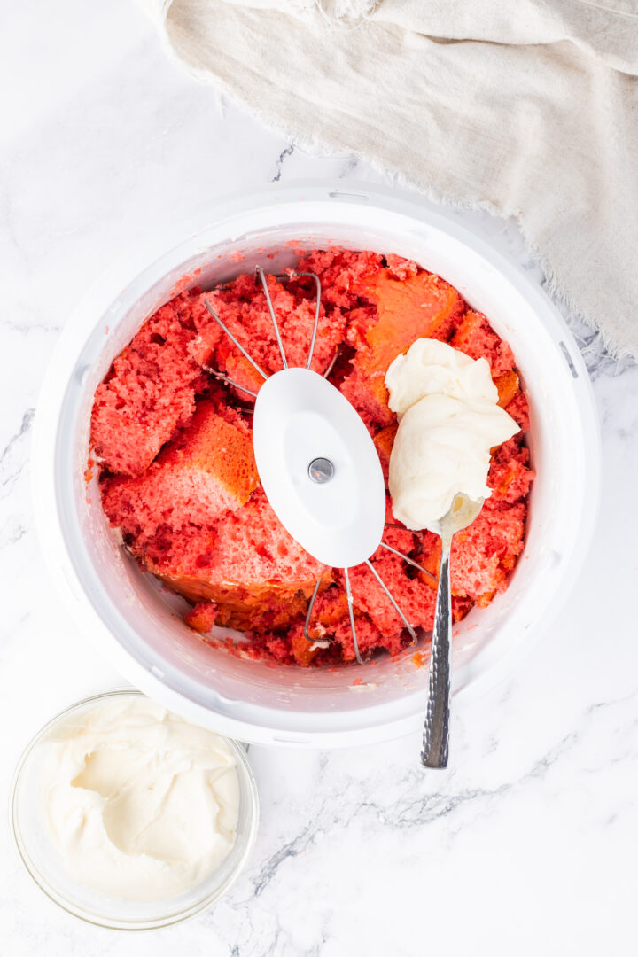 cake and frosting in a white bowl