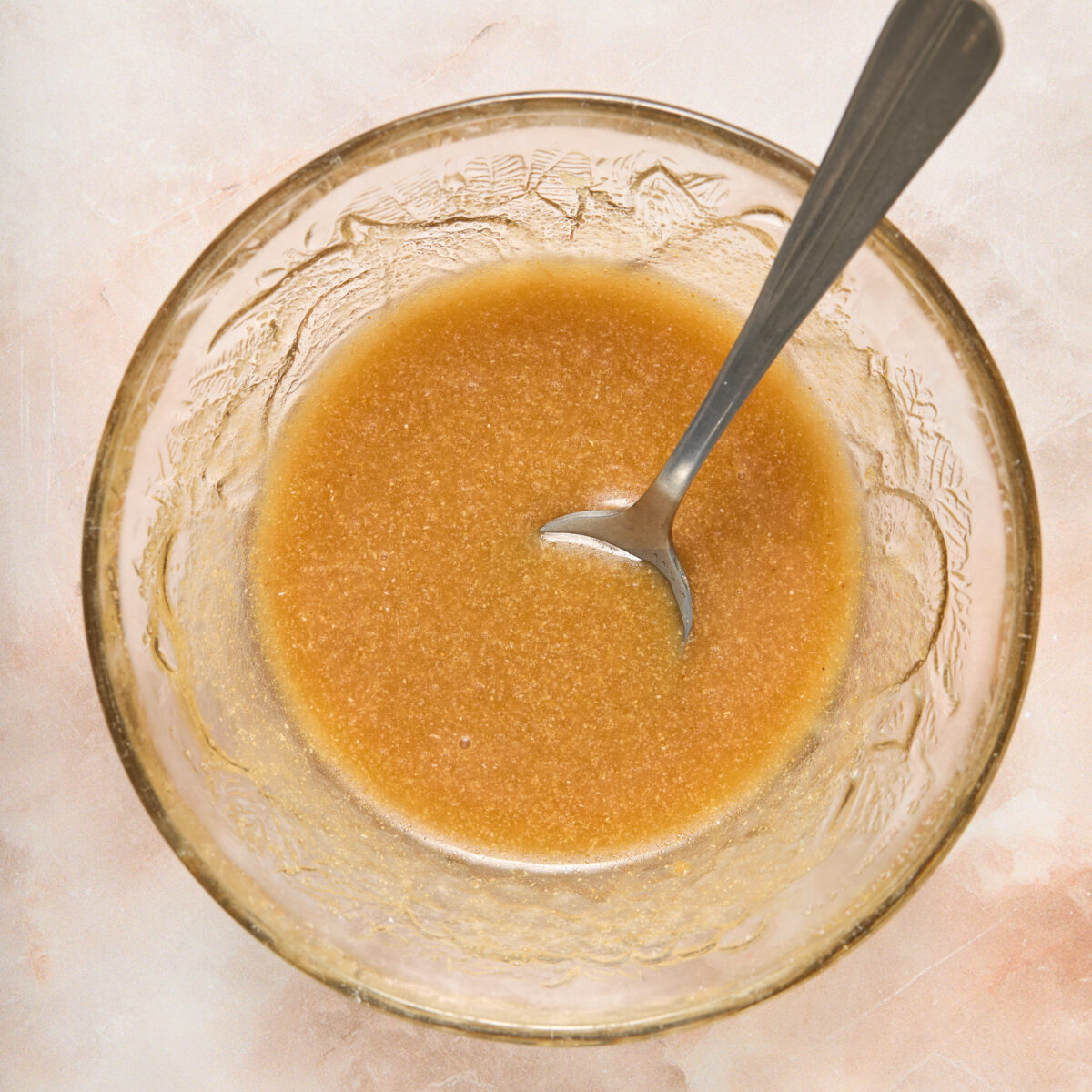 glaze ingredients whisked in a clear bowl
