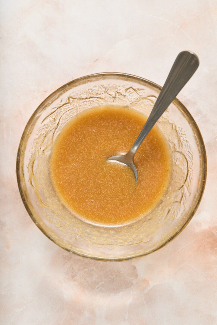 glaze ingredients whisked in a clear bowl