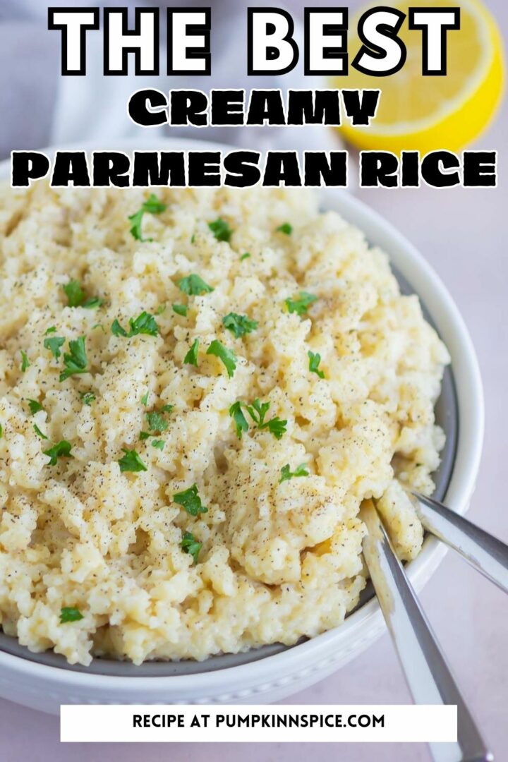 rice in a white bowl with two spoons