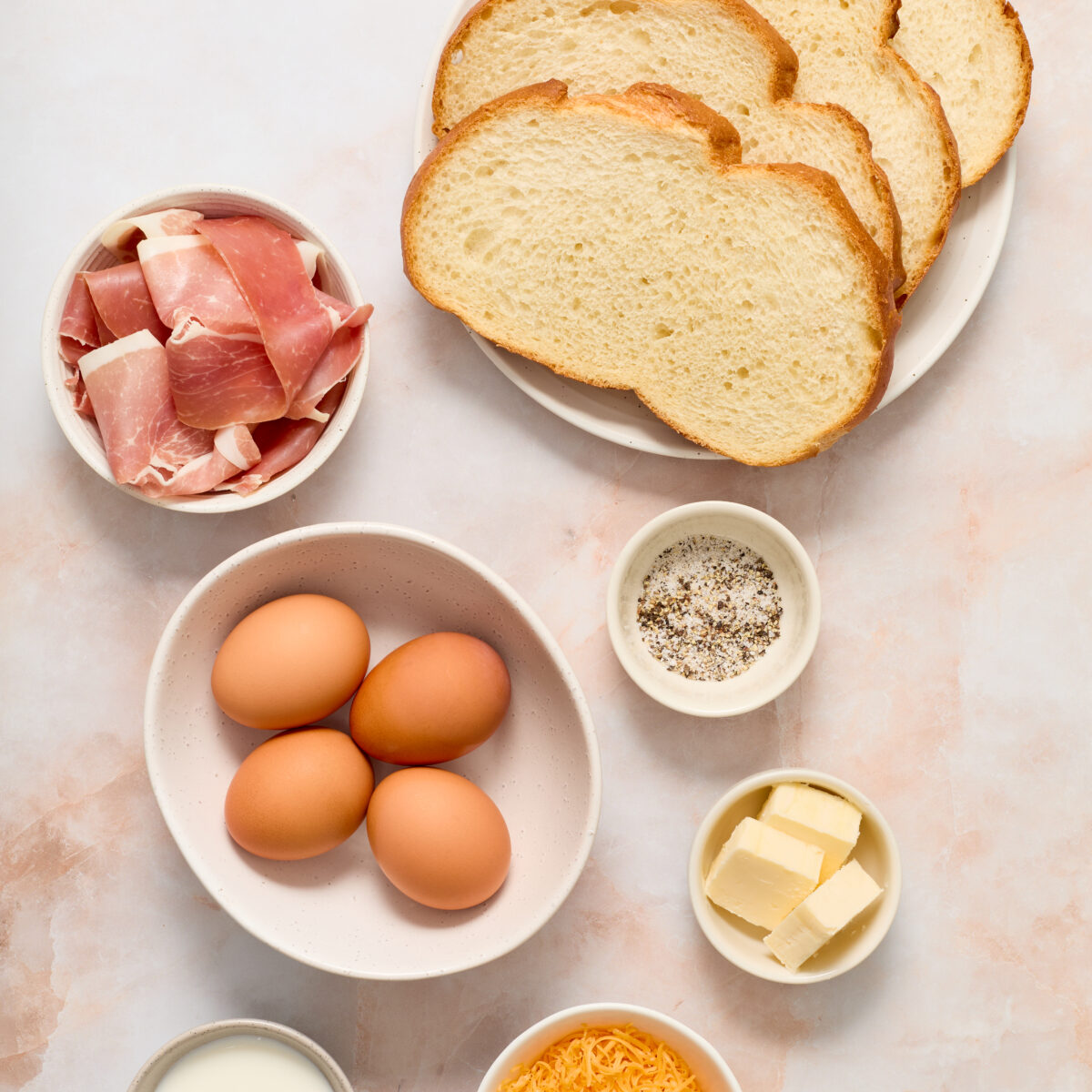 panini ingredients on a light pink surface