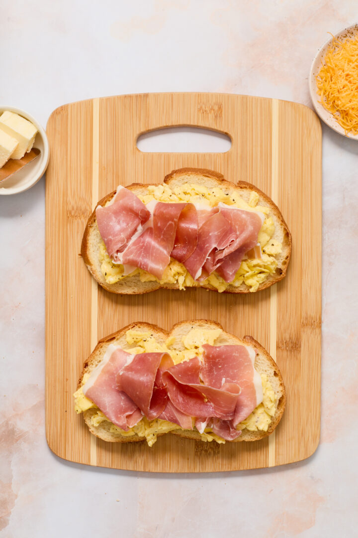 open-faced panini with eggs, prosciutto