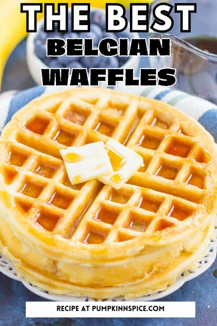 waffles on a white plate with butter and syrup
