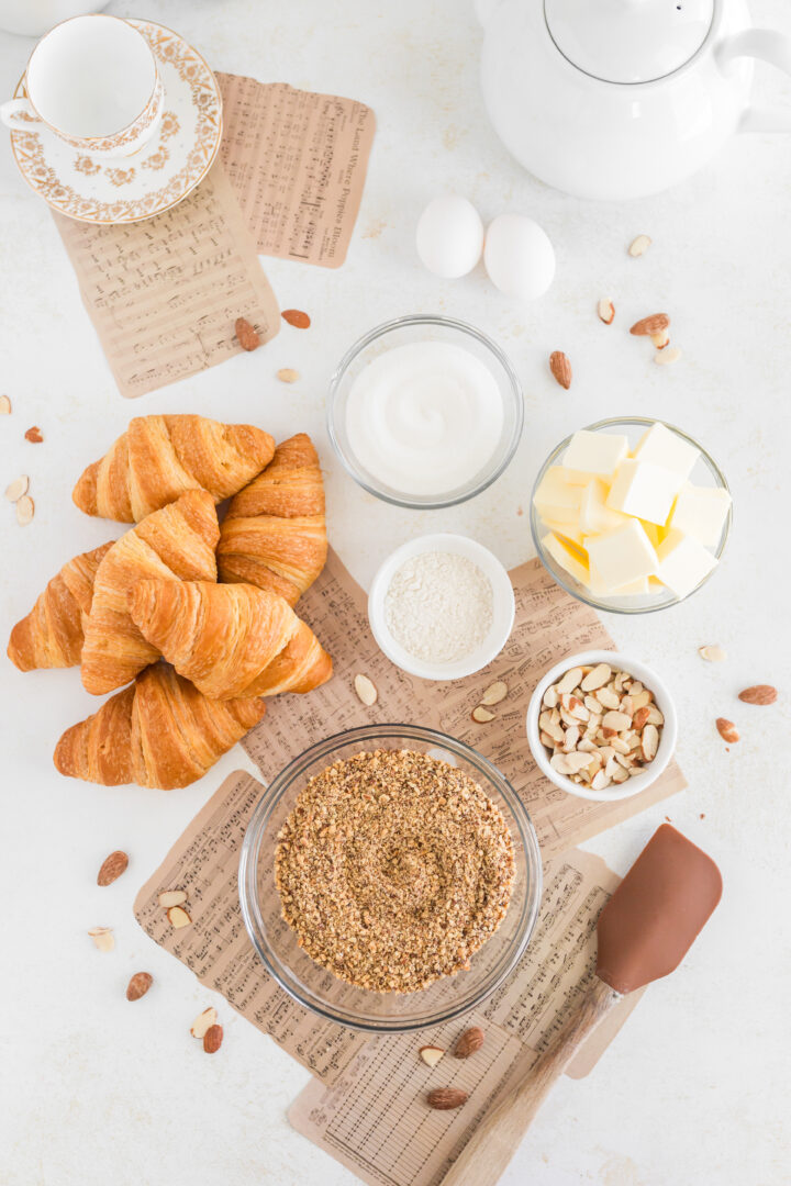 croissant ingredients on brown paper and a white surface