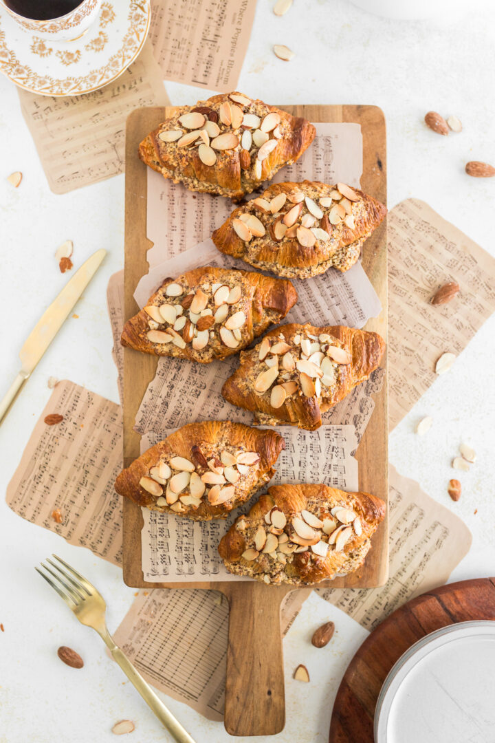 croissants show on brown paper on a white surface