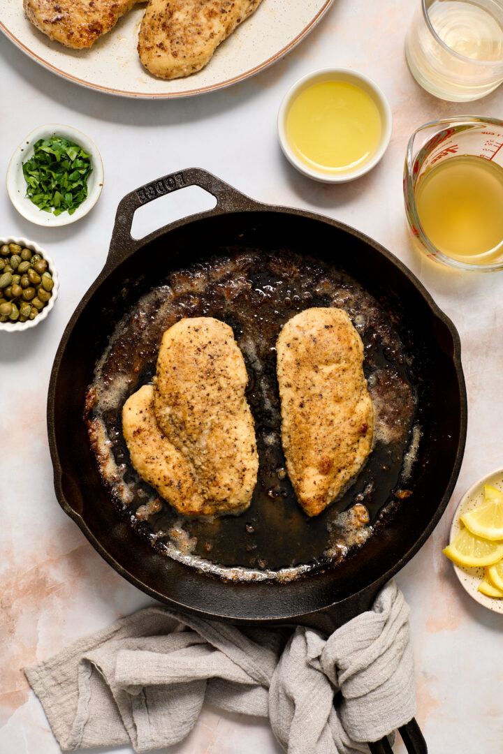 chicken in a black skillet