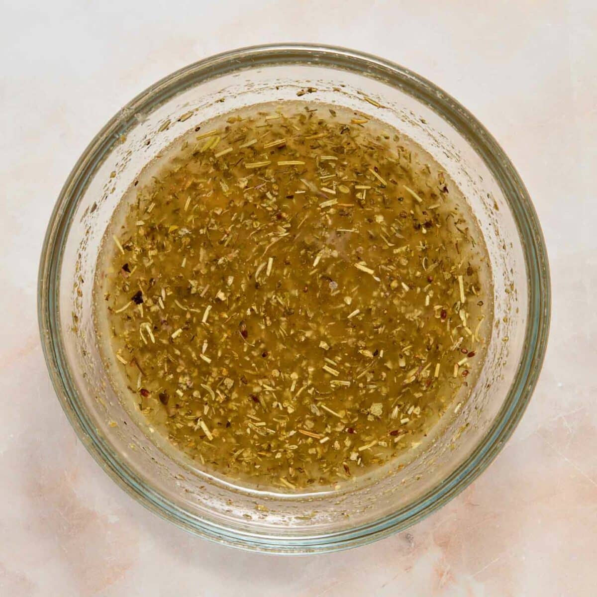 dressing mixed in a glass bowl