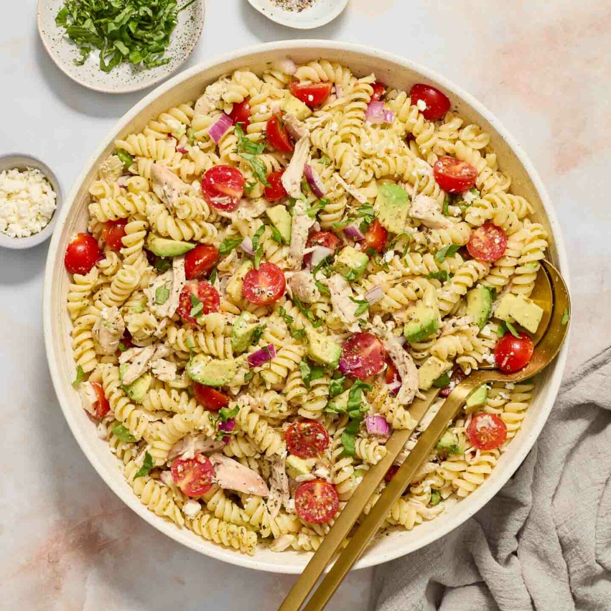 pasta salad in a white serving bowl
