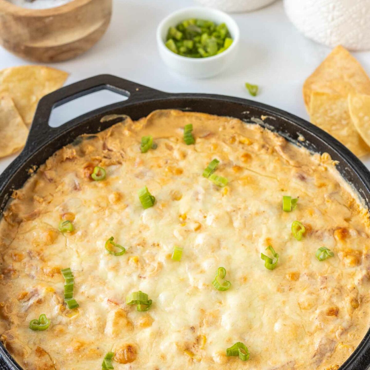 corn dip in a black skillet