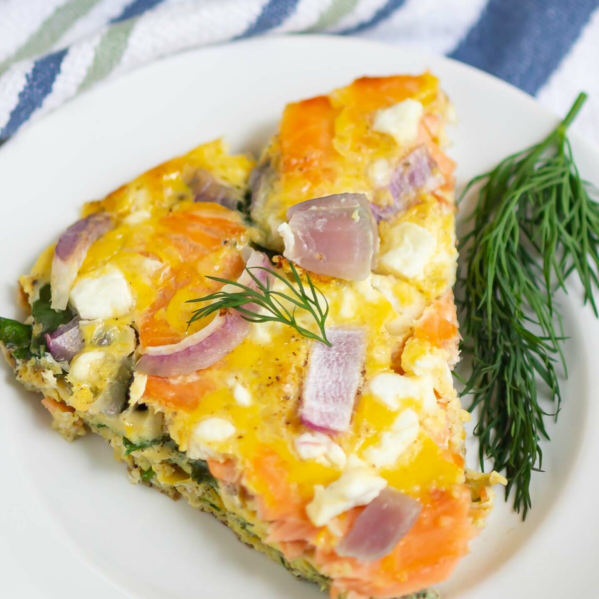 salmon frittata on a white plate