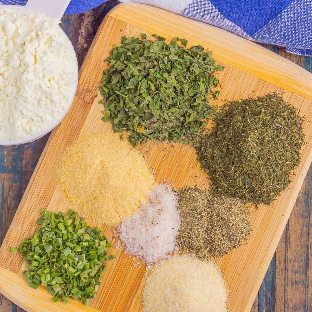 ranch seasoning mix ingredients on a wooden board