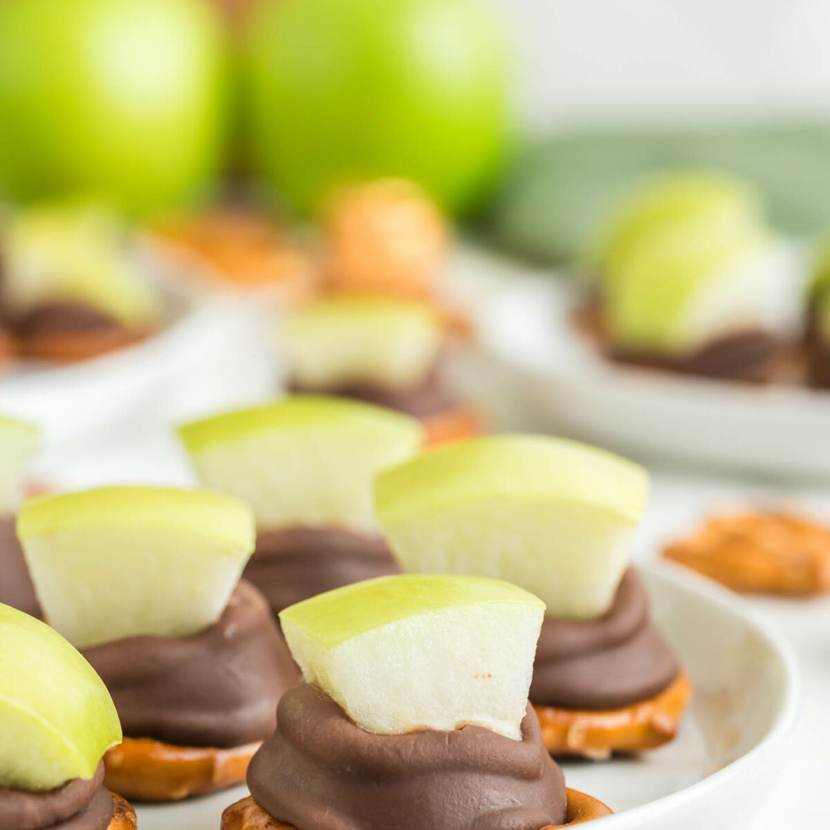 apple pretzel bites on a white plate
