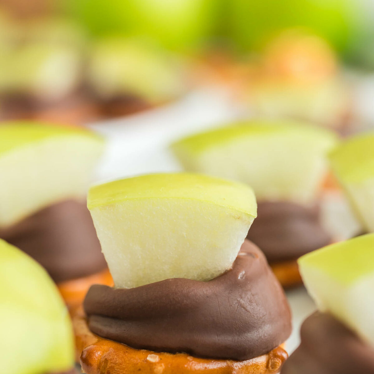 apple pretzel bites on a white surface