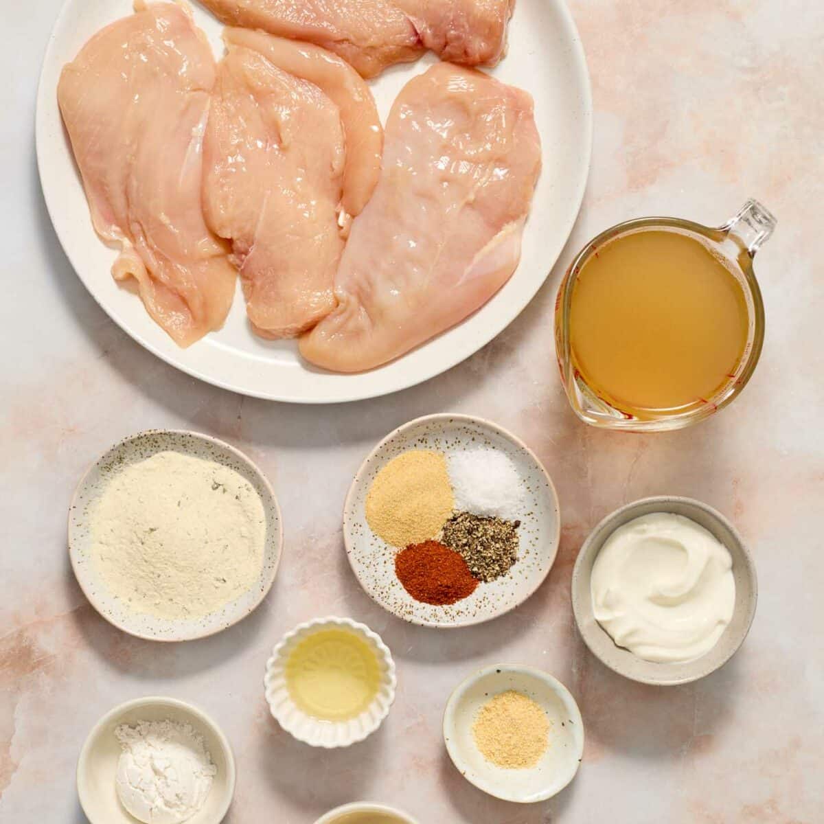 chicken ingredients in white bowls