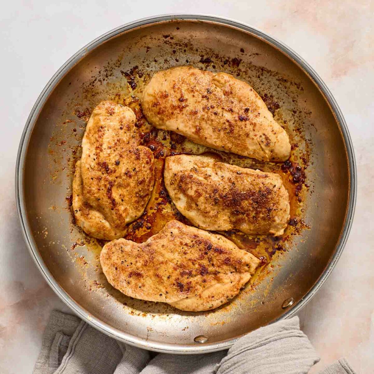 chicken seared and cooked in a skillet