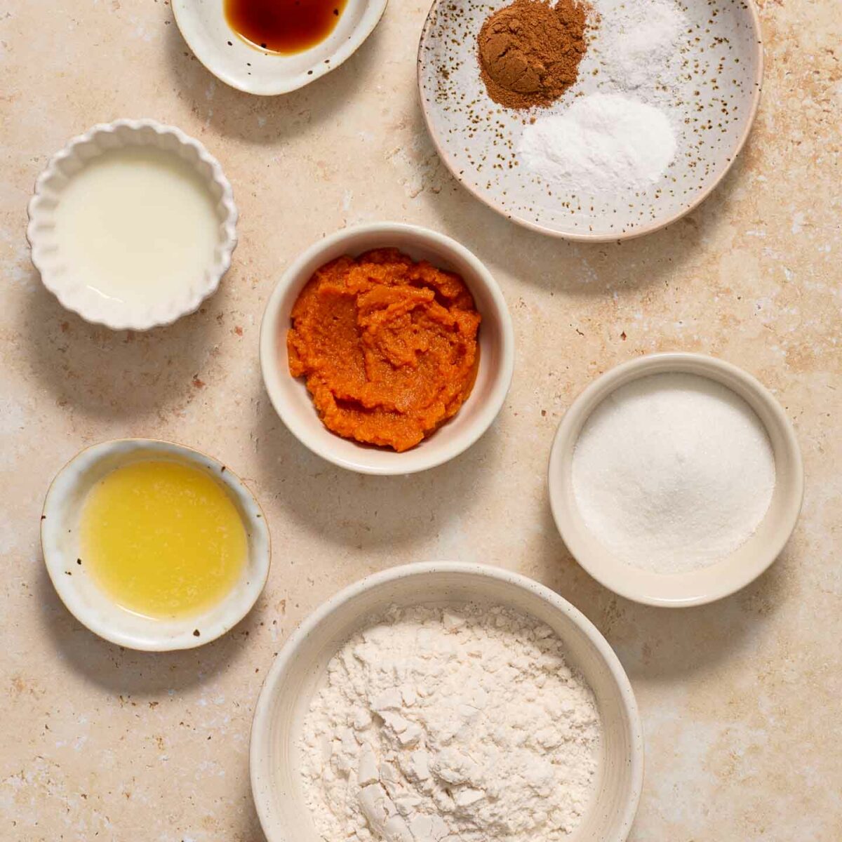 mug cake ingredients show in white bowls