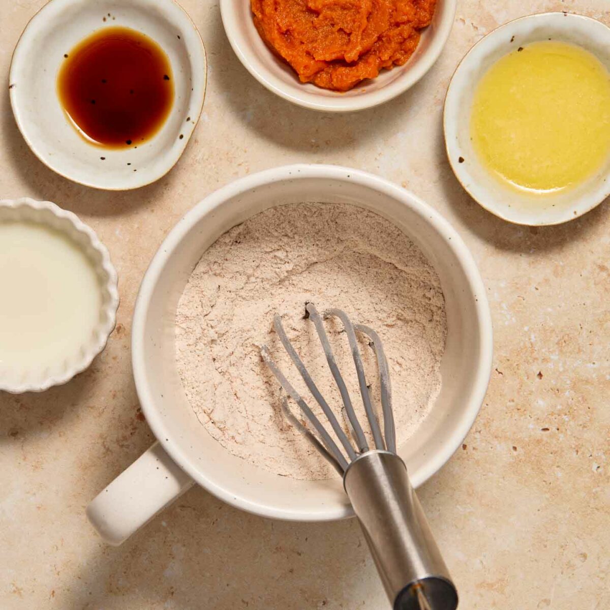 dry ingredients whisked in a white mug