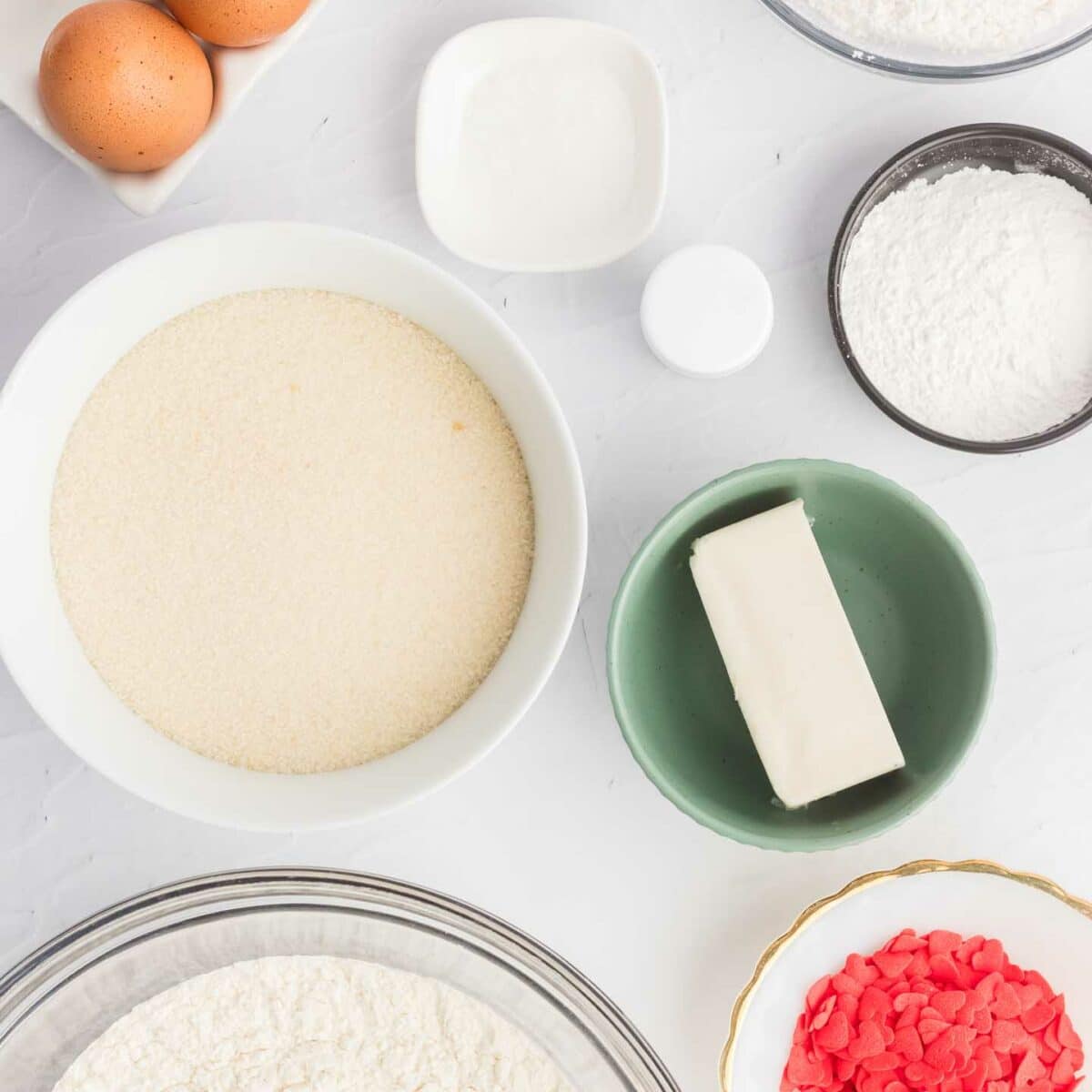 cookie ingredients in white dishes