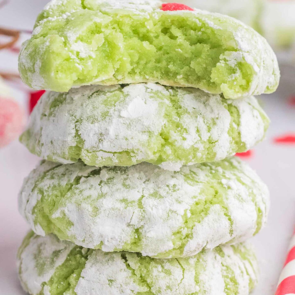 cookies stacked on top of each other with a bite taken out of the top cookie