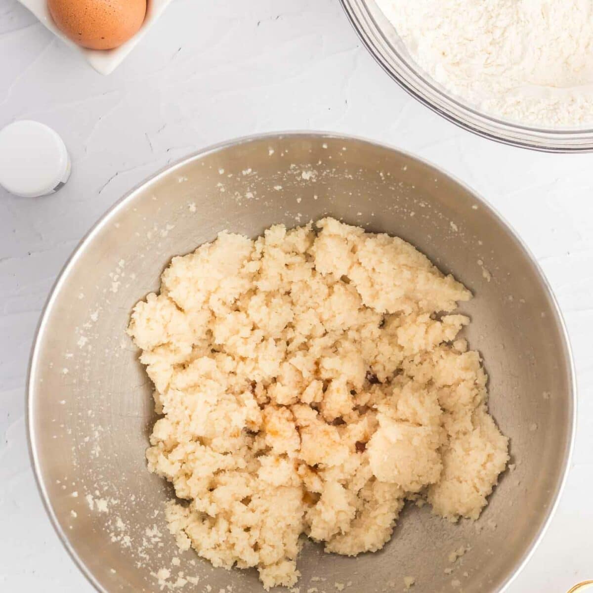 cookie dough mixed in a metal bowl