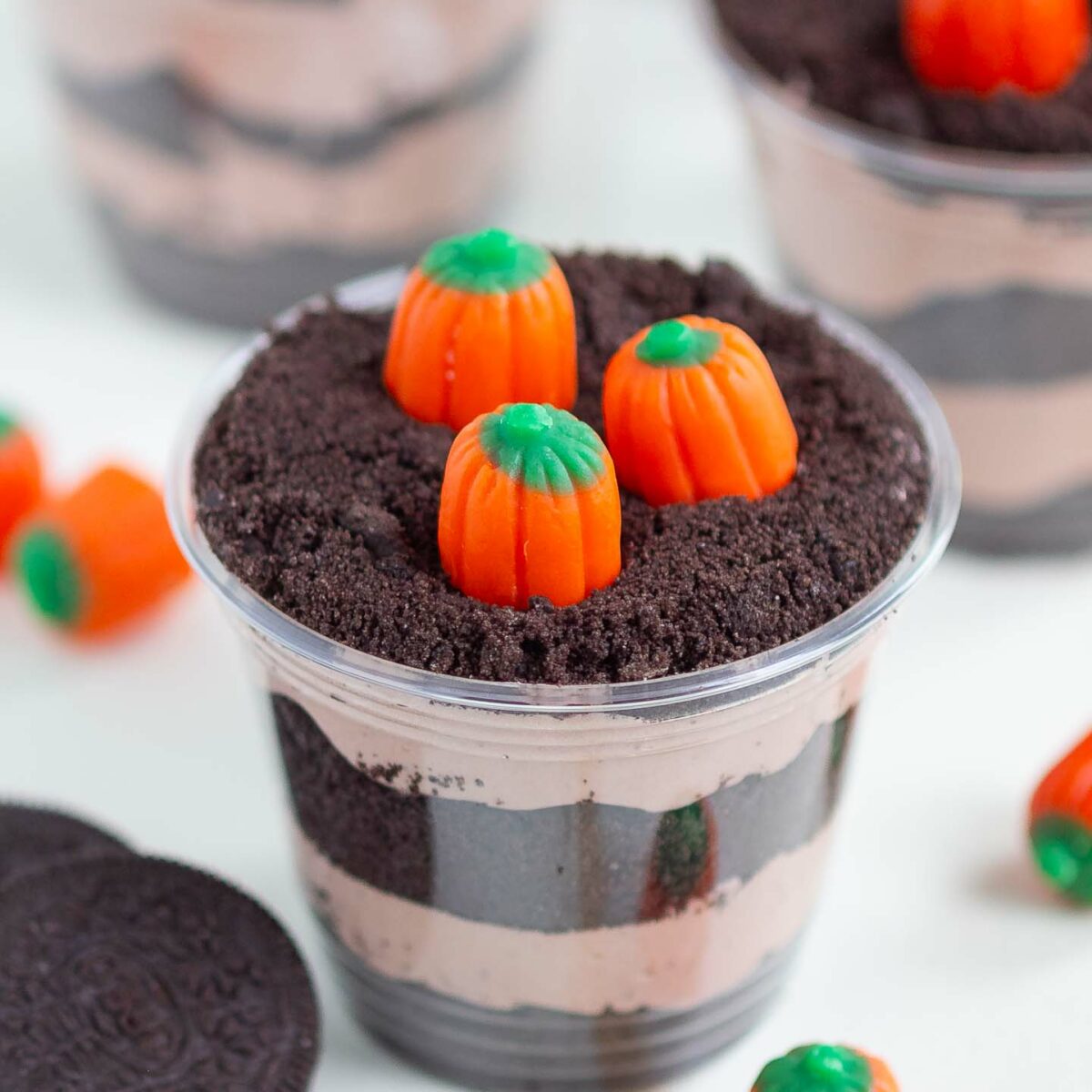 dirt cups on a white surface