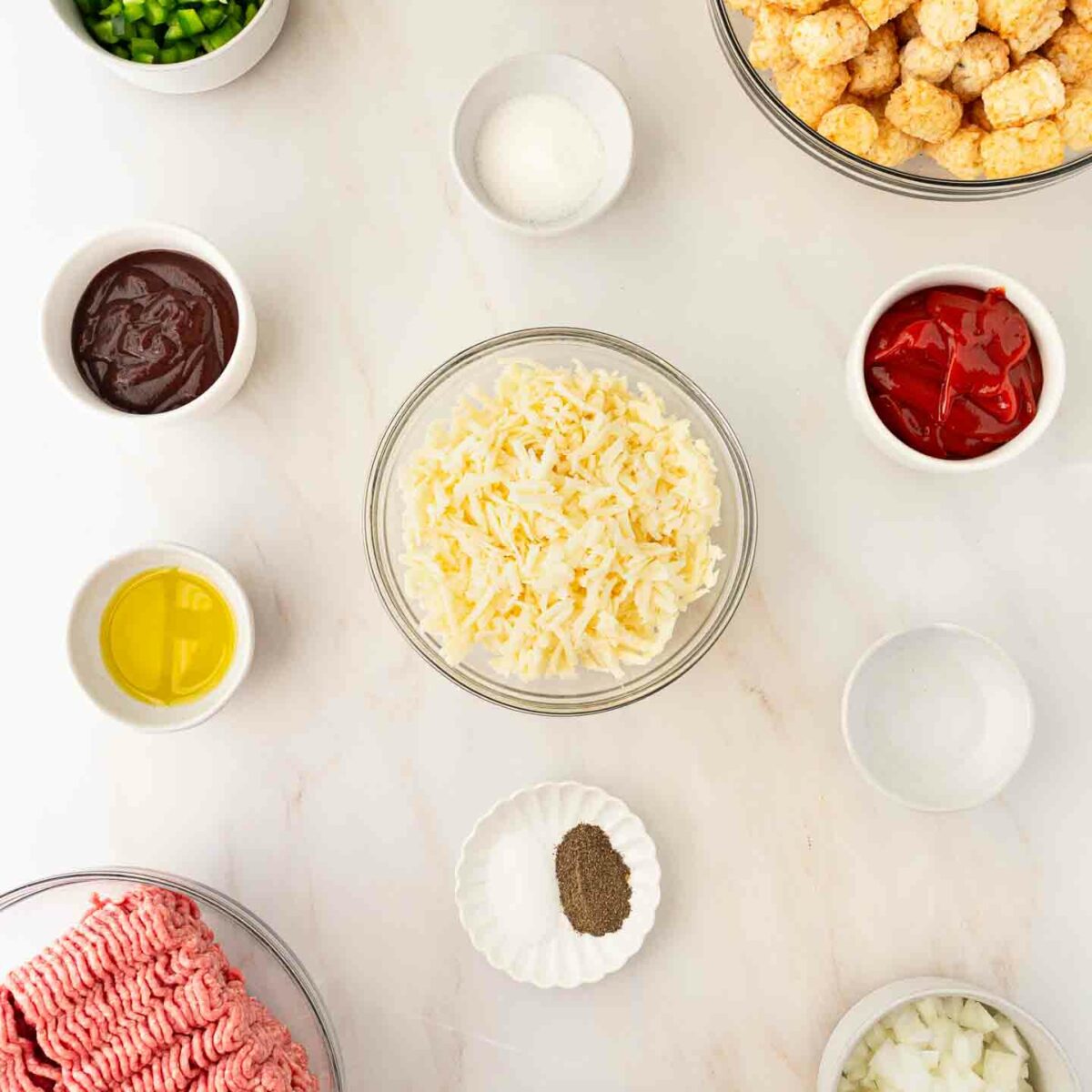 sloppy joe casserole ingredients in small bowls